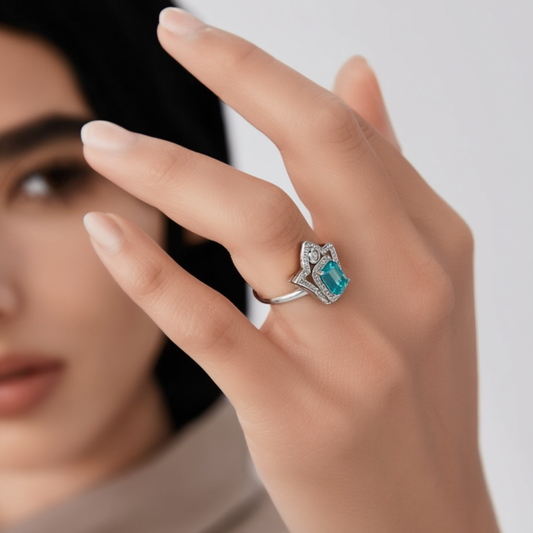 Detail of Hand of Light ring showing Hand of Fatima design and central green tourmaline