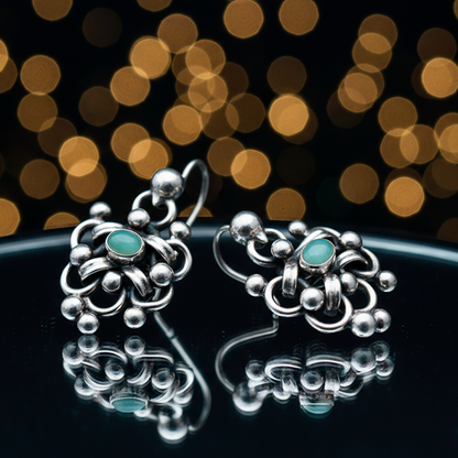 Close-up Vintage Silver Set bracelet showing turquoise dots and mini party hand design